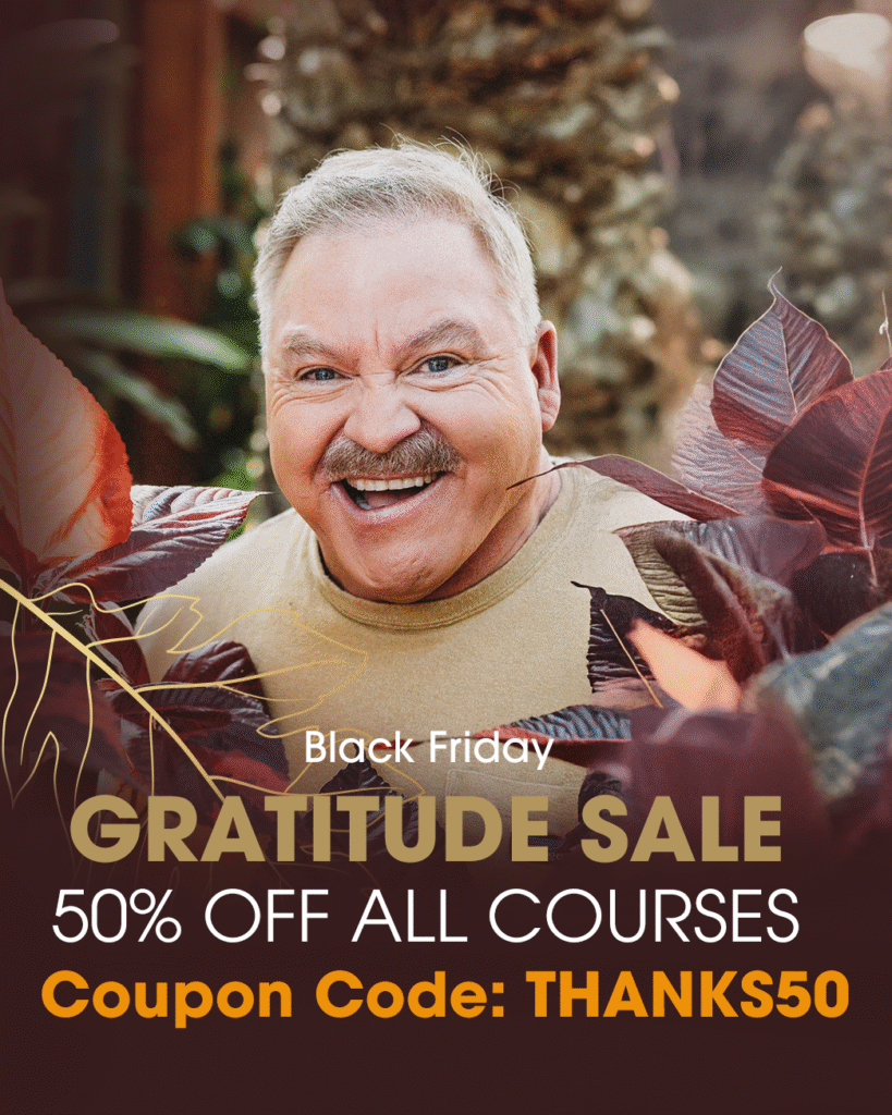 Smiling man surrounded by leaves; text reads: Black Friday Gratitude Sale, 50% off all courses, Coupon Code: THANKS50.