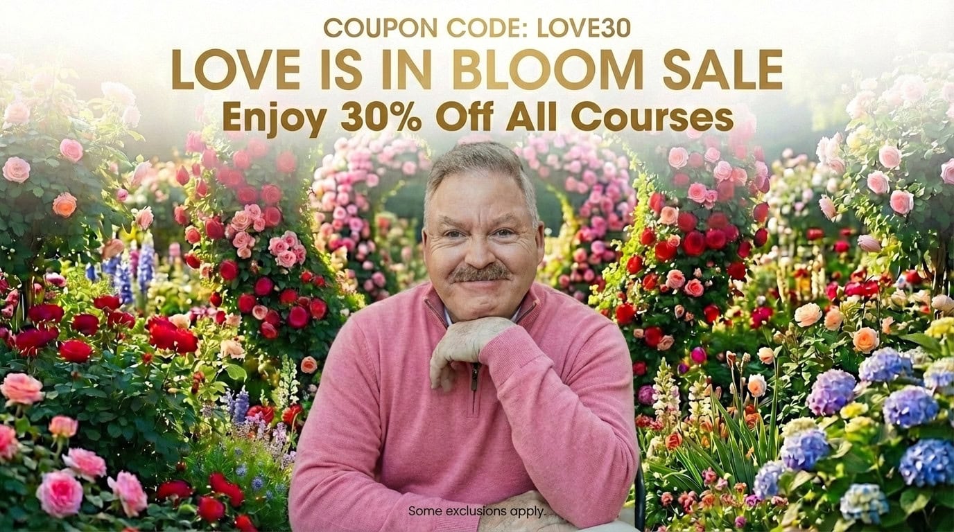 A man in a pink sweater sits among colorful blooming flowers. Text above reads: "Love Is In Bloom Sale - Enjoy 30% Off All Courses - Coupon Code: LOVE30".