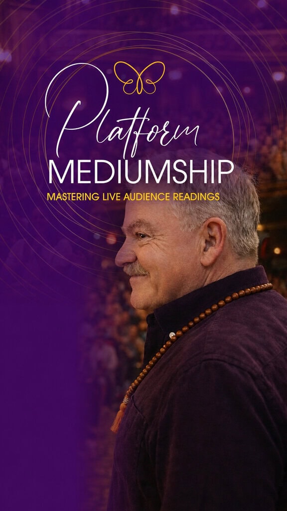A man with gray hair and a beaded necklace stands in profile before an audience with text overlay reading "Platform Mediumship: Mastering Live Audience Readings.